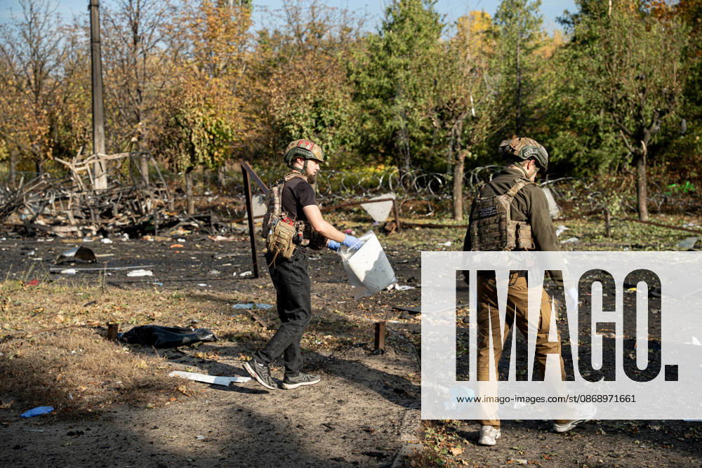 Russian Strike Hits Kramatorsk Buses Emergency workers move through debris near a damaged bus after a Russian strike in Kramatorsk, Donetsk region, Ukraine, on October 8, 2026. Ukrainian authorities said a Russian guided bomb struck two scheduled passenger buses in Kramatorsk at about 10:00. At least 30 people were killed and at least 18 wounded, while Ukraine s State Emergency Service later reported 33 deaths; public transport in Kramatorsk and nearby Sloviansk was suspended after the attack. Kramatorsk Donetsk Ukraine