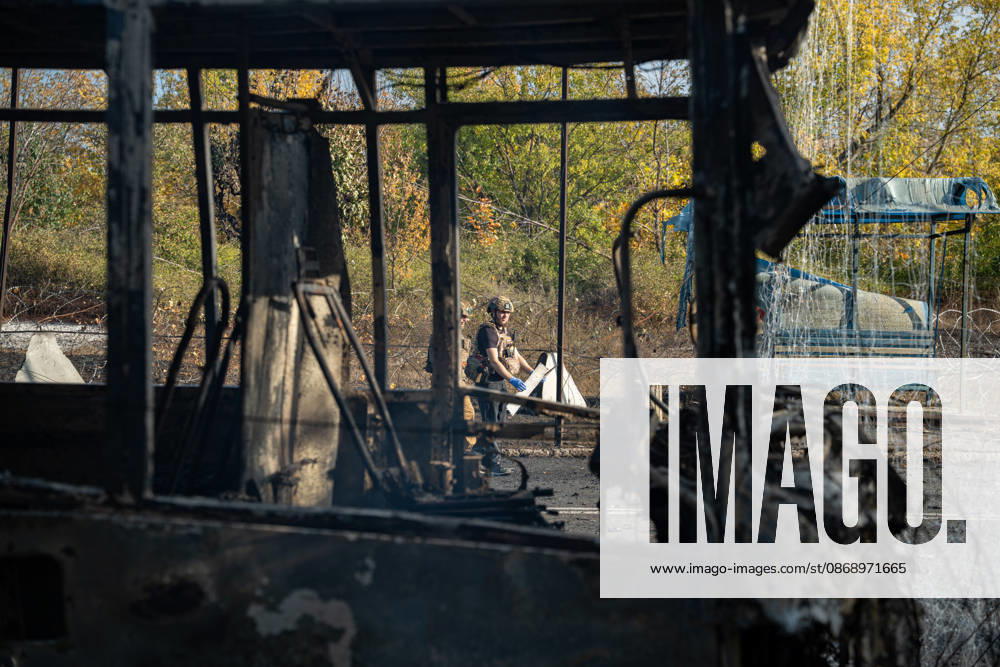 Russian Strike Hits Kramatorsk Buses A fully covered body and an emergency worker are seen through the charred frame of a destroyed passenger bus after a Russian strike in Kramatorsk, Donetsk region, Ukraine, on October 8, 2026. Ukrainian authorities said a Russian guided bomb struck two scheduled passenger buses in Kramatorsk at about 10:00. At least 30 people were killed and at least 18 wounded, while Ukraine s State Emergency Service later reported 33 deaths; public transport in Kramatorsk and nearby Sloviansk was suspended after the attack. Kramatorsk Donetsk Ukraine
