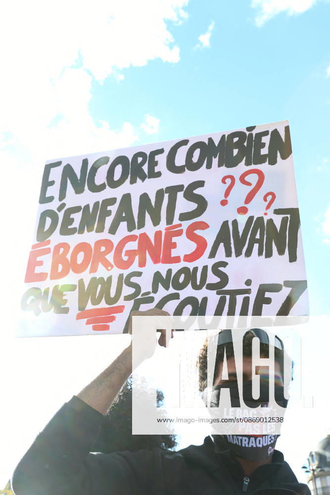 High School And University Student Protest - Paris A protester holds a sign reading How many more children must be blinded before you listen to us? at Place de la Bastille during a nationwide youth demonstration. Nationwide mobilization by high school and university students calling for better teaching and study conditions, increased funding and staffing, an end to overcrowded classrooms and deteriorating infrastructure, and improved access to education, amidst concerns over social inequalities and student financial insecurity in Paris, France, October 8, 2026. Photo by Christophe Michel ABACAPRESS.COM Paris ILE DE FRANCE France