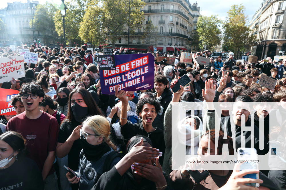High School And University Student Protest - Paris A crowd of protesters gathers at Place de la Bastille with students holding signs in support of student youth during a nationwide youth demonstration. Nationwide mobilization by high school and university students calling for better teaching and study conditions, increased funding and staffing, an end to overcrowded classrooms and deteriorating infrastructure, and improved access to education, amidst concerns over social inequalities and student financial insecurity in Paris, France, October 8, 2026. Photo by Christophe Michel ABACAPRESS.COM Paris ILE DE FRANCE France
