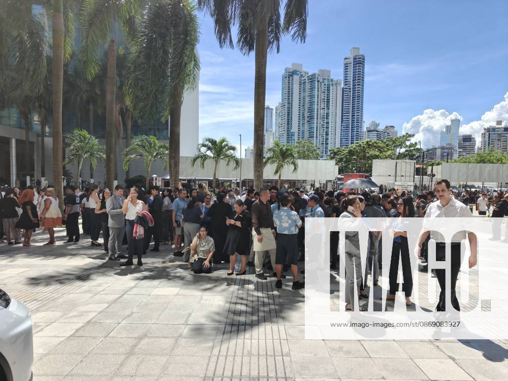 (261009) -- PANAMA CITY, Oct. 9, 2026 -- People gather outside following an earthquake in Panama City, Panama, Oct. 9, 2026. Major earthquake strikes Panama on Friday. ) PANAMA-PANAMA CITY-EARTHQUAKE LixJiaxu