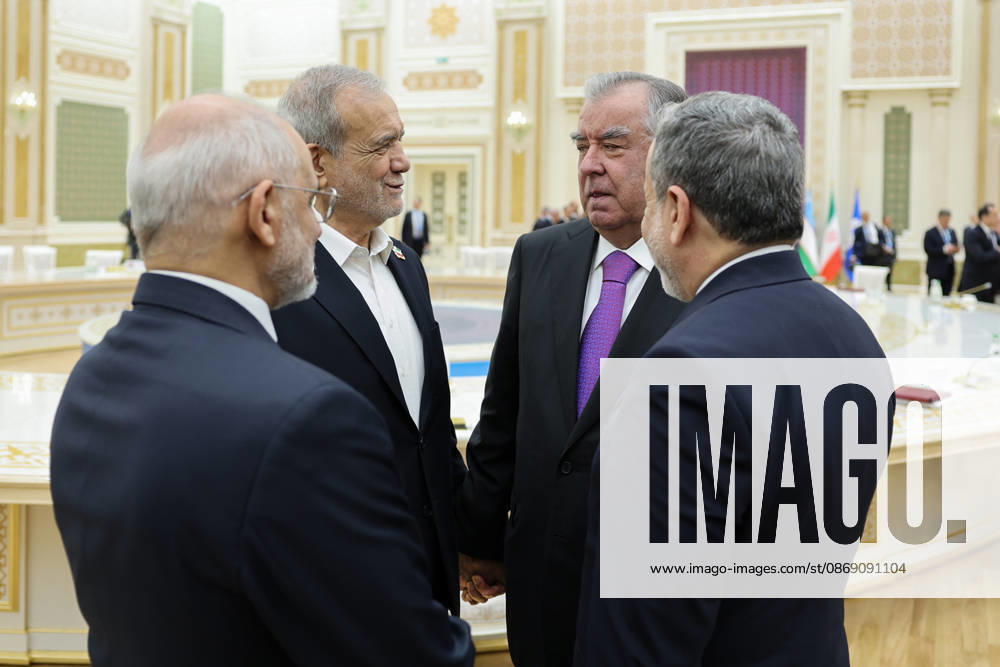 Iranian President Masoud Pezeshkian speaks with Tajik President Emomali Rahmon and other delegates on the sidelines of the CIS Council of Heads of State meeting in the Avaza National Tourist Zone in Turkmenbashi, Turkmenistan, on October 9, 2026. The meeting, chaired by Turkmen President Serdar Berdimuhamedov, brought together leaders of CIS states and CIS Secretary General Sergey Lebedev, with Pezeshkian participating for the first time as a special guest. Turkmenbashi Turkmenistan - ZUMAi98_ 20261009_zih_i98_073
