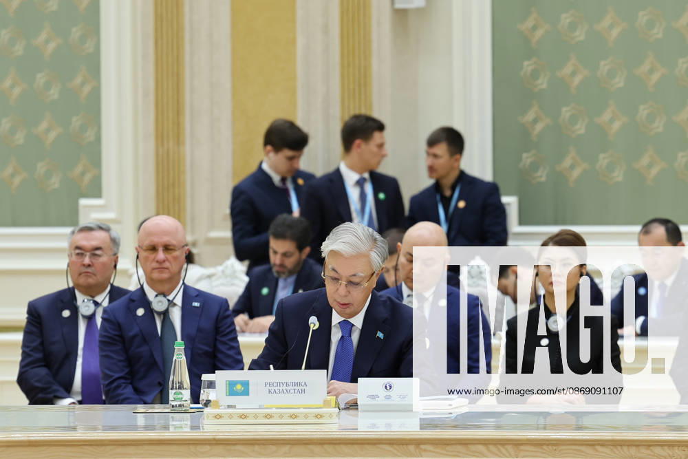 Kazakh President Kassym-Jomart Tokayev reads from documents behind Kazakhstan s nameplate during the Caspian Environmental Summit in the Avaza National Tourist Zone in Turkmenbashi, Turkmenistan, on October 9, 2026. The first Caspian Environmental Summit, chaired by Turkmen President Serdar Berdimuhamedov, brought together the presidents of Azerbaijan, Iran, Kazakhstan and Russia. The leaders adopted a joint decision aimed at strengthening five-party cooperation on falling Caspian Sea levels, while Pezeshkian called for joint scientific research, data sharing, coordinated action and stronger implementation of the Tehran Convention. Turkmenbashi Turkmenistan - ZUMAi98_ 20261009_zih_i98_076