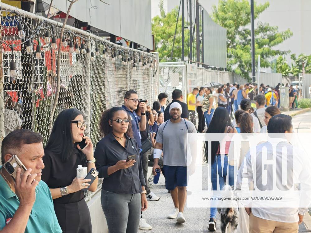 (261009) -- PANAMA CITY, Oct. 9, 2026 -- People gather outside following an earthquake in Panama City, Panama, Oct. 9, 2026. A major earthquake struck Panama on Friday. ) PANAMA-PANAMA CITY-EARTHQUAKE LixJiaxu