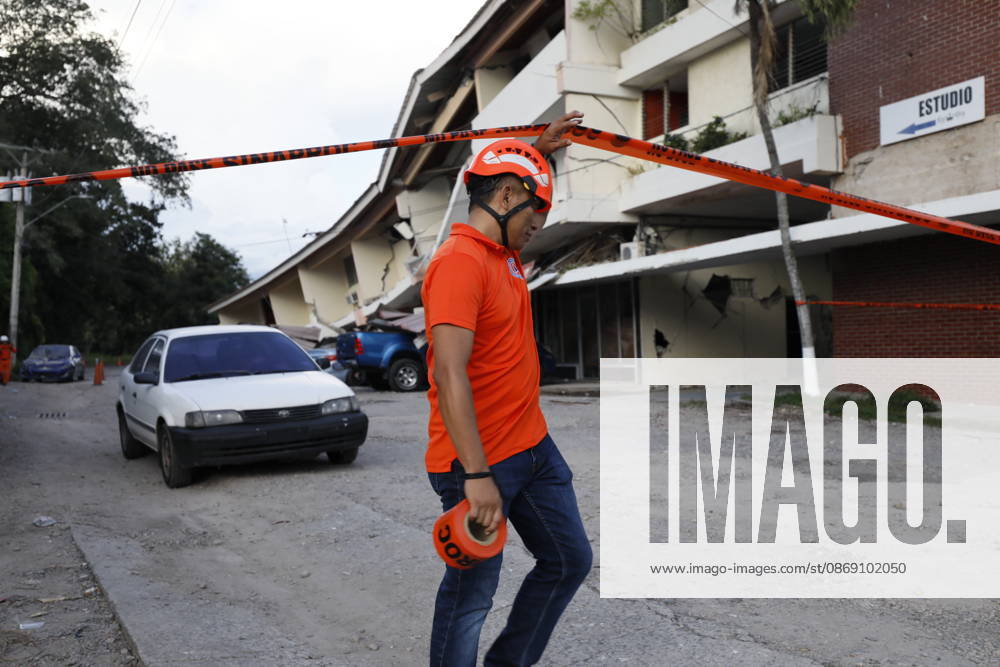 (261009) -- PENONOME(PANAMA), Oct. 9, 2026 -- A rescuer stands in front of a collapsed building after an earthquake in Penonome, central Cocle Province of Panama, Oct. 9, 2026. A major earthquake struck Panama on Friday. (Photo by Xinhua) PANAMA-PENONOME-EARTHQUAKE DanielxGonzalez