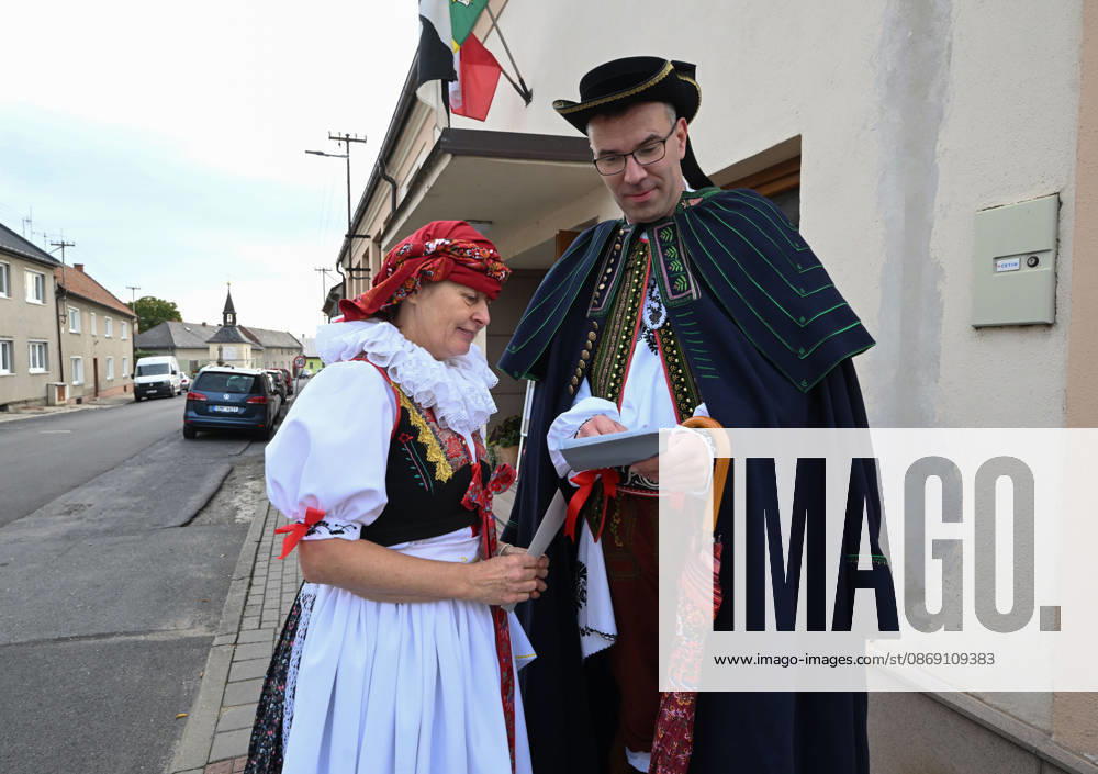 The two-day elections to municipal assemblies continued in the Czech Republic together with the first round of the elections to one-third of the Senate, on October 10, 2026. On the photo voters wearing traditional Hana folk costumes cast their ballots in Kozusany-Tazaly, in the Olomouc Region. (CTKxPhoto LudekxPerina) CTKPhotoP2026101001690 CTKPhotoP2026101001690
