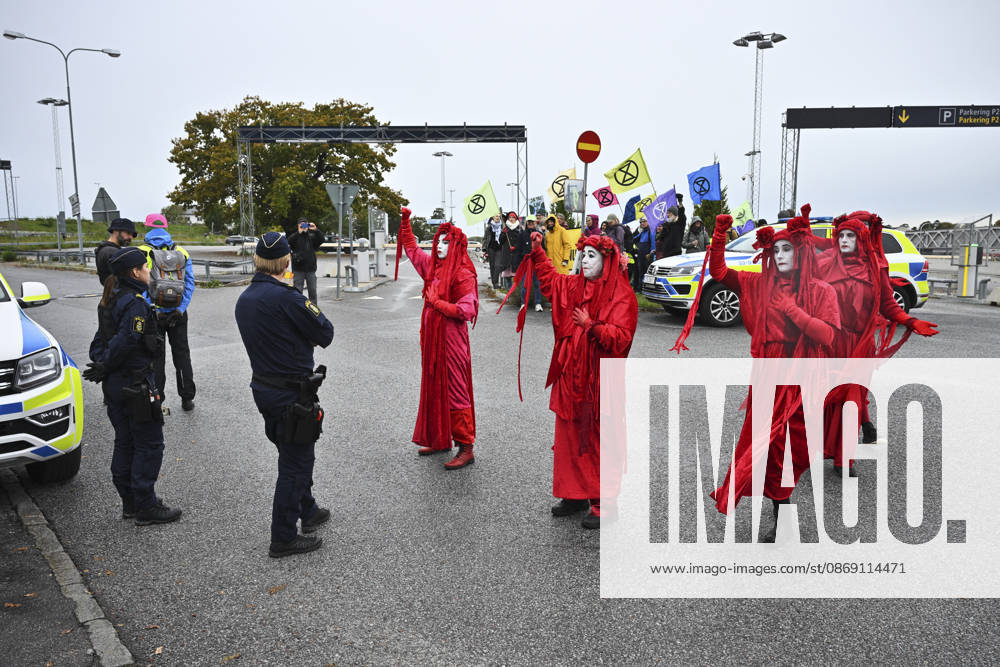 Climate activists outside Bromma Stockholm Airport; some climate activists have entered the airport and are staging protests, including on the runway, in Stockholm, Sweden, October 10, 2026 STOCKHOLM SWEDEN