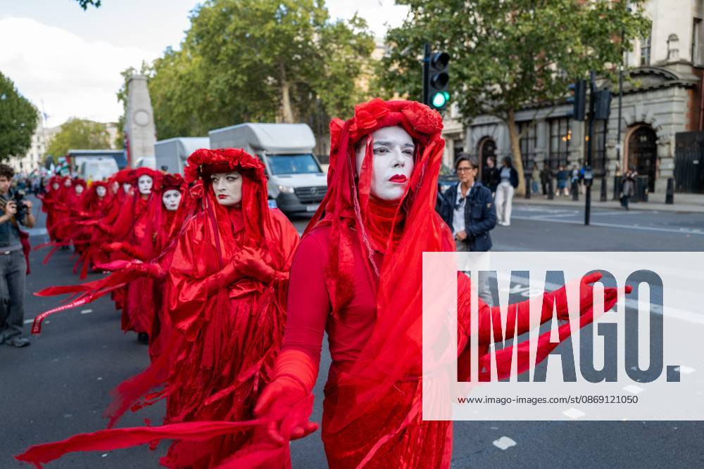 Performers from Extinction Rebellion s Red Rebel Brigade stage a silent Walk of Shame procession during the National March for Palestine in London. The National March marks three years since the outbreak of the war in Gaza in October 2023.The National March for Palestine, which was organised by the Palestine Coalition in London. The march marks three years since the outbreak of the war in Gaza in October 2023 London United Kingdom - ZUMAs197 20261010_aaa_s197_058