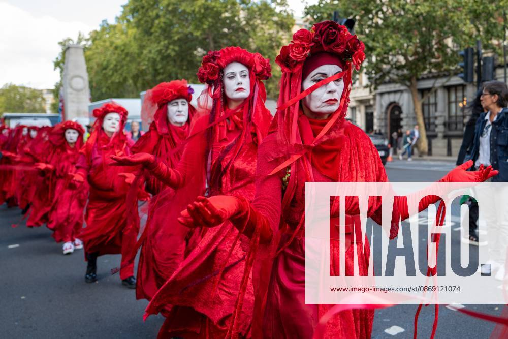 Performers from Extinction Rebellion s Red Rebel Brigade stage a silent Walk of Shame procession during the National March for Palestine in London. The National March marks three years since the outbreak of the war in Gaza in October 2023.The National March for Palestine, which was organised by the Palestine Coalition in London. The march marks three years since the outbreak of the war in Gaza in October 2023 London United Kingdom - ZUMAs197 20261010_aaa_s197_063