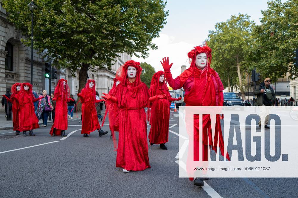 Performers from Extinction Rebellion s Red Rebel Brigade stage a silent Walk of Shame procession during the National March for Palestine in London. The National March marks three years since the outbreak of the war in Gaza in October 2023.The National March for Palestine, which was organised by the Palestine Coalition in London. The march marks three years since the outbreak of the war in Gaza in October 2023 London United Kingdom - ZUMAs197 20261010_aaa_s197_066