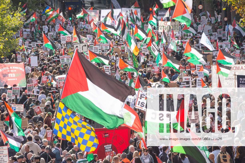 The National March for Palestine took place to mark the third anniversary of the start of the war in Gaza. Around ten thousand gathered on The Thames embankment and marched to Parliament Squre. They faced an Israeli counter demonstration of a handfull of protesters. Some arrests were reported by police. London England - ZUMAr169 20261010_zip_r169_055