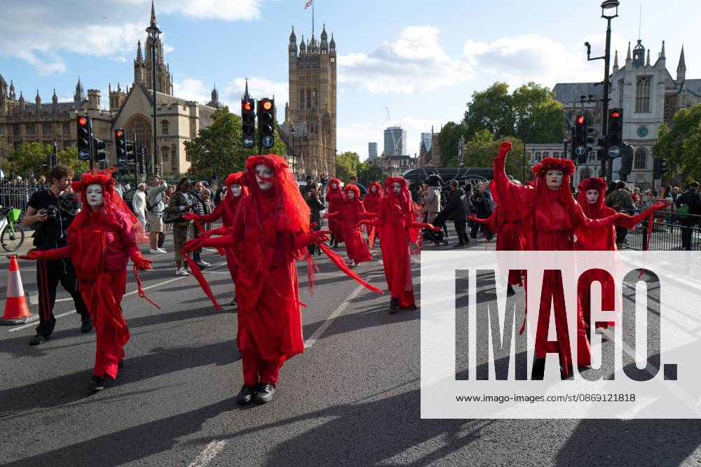 Performers from Extinction Rebellion s Red Rebel Brigade stage a silent Walk of Shame procession during the National March for Palestine in London. The National March marks three years since the outbreak of the war in Gaza in October 2023.The National March for Palestine, which was organised by the Palestine Coalition in London. The march marks three years since the outbreak of the war in Gaza in October 2023 London United Kingdom - ZUMAs197 20261010_aaa_s197_062