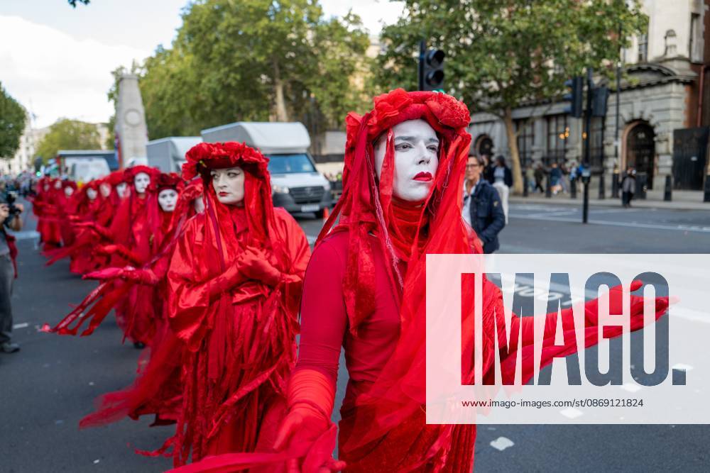Performers from Extinction Rebellion s Red Rebel Brigade stage a silent Walk of Shame procession during the National March for Palestine in London. The National March marks three years since the outbreak of the war in Gaza in October 2023.The National March for Palestine, which was organised by the Palestine Coalition in London. The march marks three years since the outbreak of the war in Gaza in October 2023 London United Kingdom - ZUMAs197 20261010_aaa_s197_065