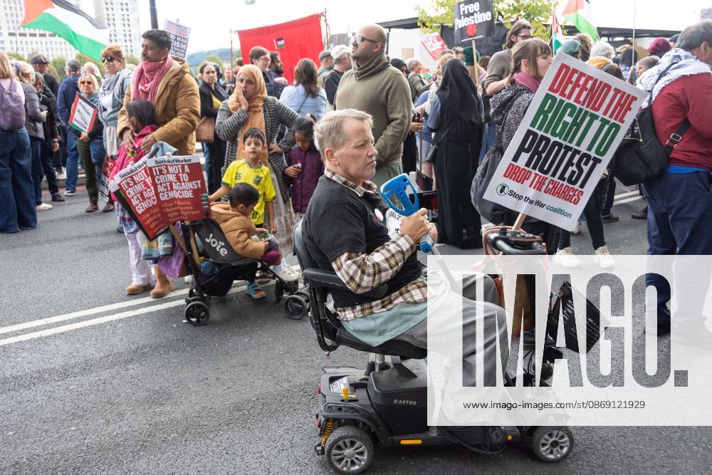 The National March for Palestine took place to mark the third anniversary of the start of the war in Gaza. Around ten thousand gathered on The Thames embankment and marched to Parliament Squre. They faced an Israeli counter demonstration of a handfull of protesters. Some arrests were reported by police. London England - ZUMAr169 20261010_zip_r169_059