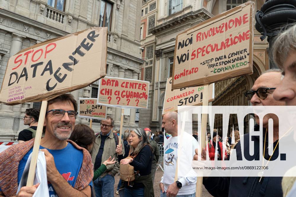 Protesters demand moratorium on new data centers in Milan MILAN, ITALY OCTOBER 10, 2026: Protesters gather for a sit-in in Piazza della Scala in central Milan to oppose the development of new data centers across Lombardy and Italy. The demonstration is organized by the Rete dei Comitati No Data Center (No Data Center Committee Network), which is calling for a moratorium on permits for new facilities. The group also urges public authorities to conduct thorough environmental, urban planning and regional assessments before approving projects. For approved facilities that have not yet begun operating, campaigners are calling for reviews to be reopened if potential microclimate effects and cumulative impacts with existing facilities were not