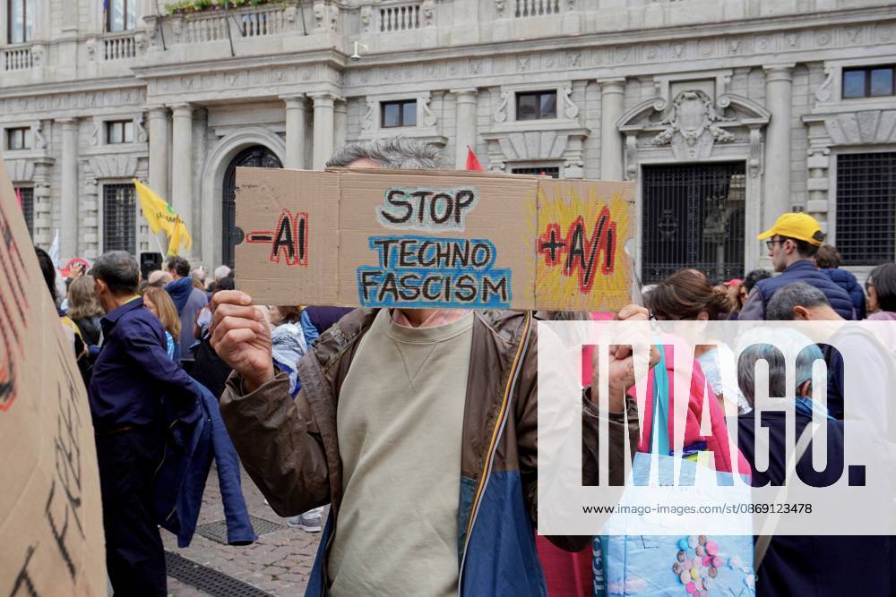 MILAN, ITALY Ã¢â‚¬ OCTOBER 10, 2026: Protesters gather for a sit-in in Piazza della Scala in central Milan to oppose the development of new data centers across Lombardy and Italy. The demonstration is organized by the Rete dei Comitati No Data Center (No Data Center Committee Network), which is calling for a moratorium on permits for new facilities. The group also urges public authorities to conduct thorough environmental, urban planning and regional assessments before approving projects. For approved facilities that have not yet begun operating, campaigners are calling for reviews to be reopened if potential microclimate effects and cumulative impacts with existing facilities were not adequately assessed. - ZUMAq101 20261010_zna_q101_179
