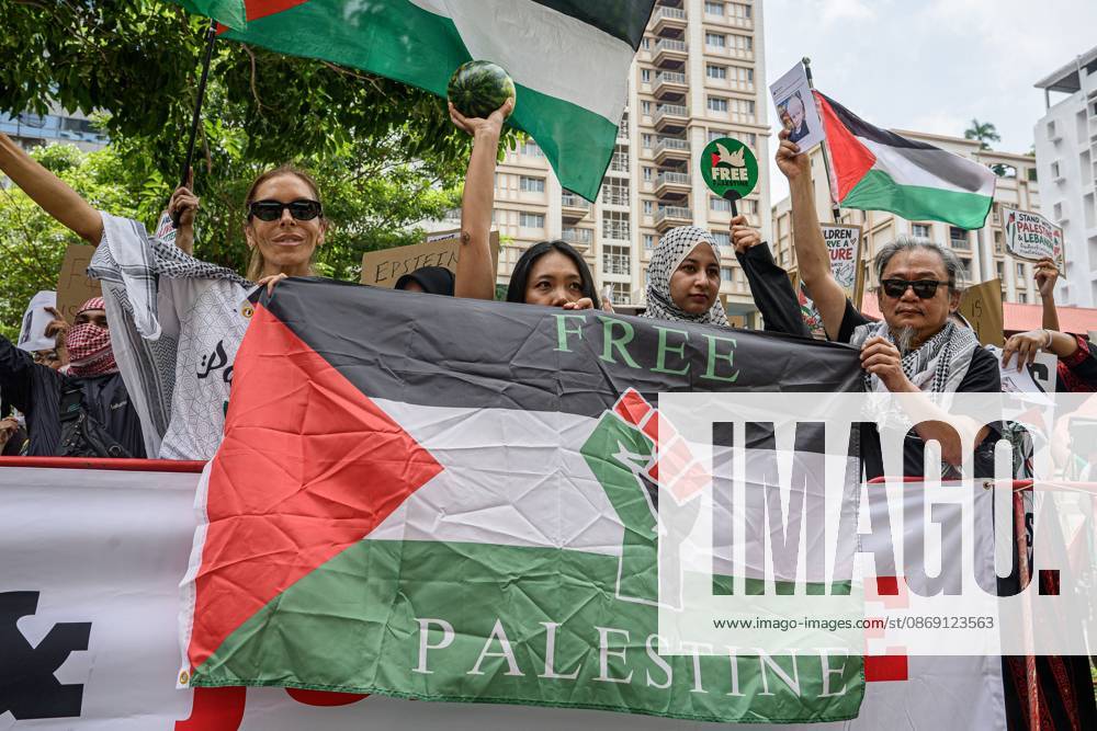 BANGKOK, THAILAND, OCTOBER 10, 2026: Pro-Palestinian demonstrators gather outside the Israeli Embassy in Bangkok during a protest marking 1,100 days since the start of the war in Gaza. Participants held portraits of Palestinians killed during the conflict for three minutes in an action titled Every Life Isn t Just a Number, symbolizing three years of war. The demonstration was held as part of a Global Action Day for Palestine. Bangkok Thailand - ZUMAq101 20261010_zna_q101_173