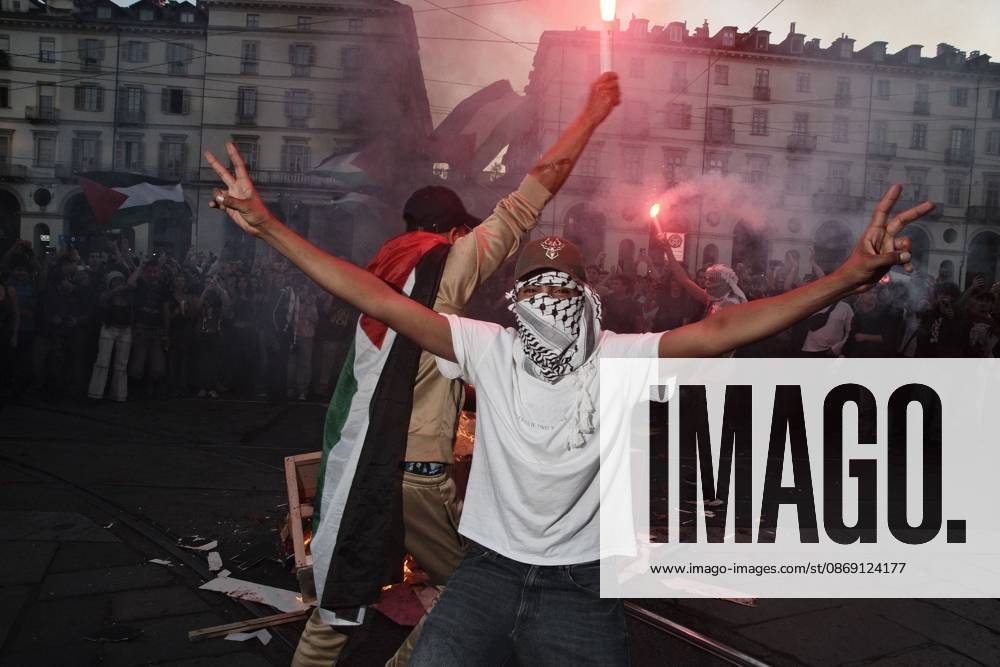 Turin, IT: TURIN, ITALY, OCTOBER 10, 2026: Thousands of pro-Palestinian demonstrators march through Turin during a protest organized by the Torino per Gaza coalition. Tensions erupted near Piazza Castello when police blocked access to the square, leading to clashes between demonstrators and riot police before some protesters were allowed to enter. Participants carried Palestinian flags and displayed effigies of Israeli Prime Minister Benjamin Netanyahu and US President Donald Trump as they marched through the city in support of Palestine. Turin IT - ZUMAq101 20261010_zna_q101_259