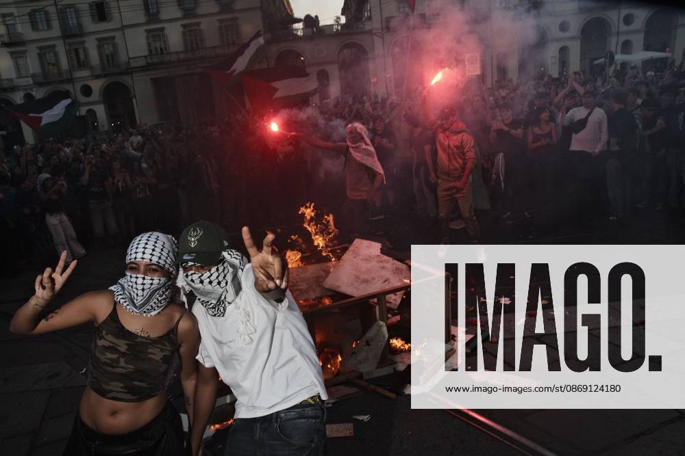 Turin, IT: TURIN, ITALY, OCTOBER 10, 2026: Thousands of pro-Palestinian demonstrators march through Turin during a protest organized by the Torino per Gaza coalition. Tensions erupted near Piazza Castello when police blocked access to the square, leading to clashes between demonstrators and riot police before some protesters were allowed to enter. Participants carried Palestinian flags and displayed effigies of Israeli Prime Minister Benjamin Netanyahu and US President Donald Trump as they marched through the city in support of Palestine. Turin IT - ZUMAq101 20261010_zna_q101_262