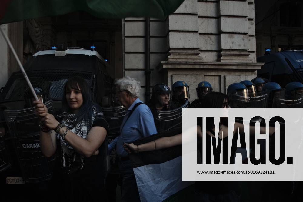 Turin, IT: TURIN, ITALY, OCTOBER 10, 2026: Thousands of pro-Palestinian demonstrators march through Turin during a protest organized by the Torino per Gaza coalition. Tensions erupted near Piazza Castello when police blocked access to the square, leading to clashes between demonstrators and riot police before some protesters were allowed to enter. Participants carried Palestinian flags and displayed effigies of Israeli Prime Minister Benjamin Netanyahu and US President Donald Trump as they marched through the city in support of Palestine. Turin IT - ZUMAq101 20261010_zna_q101_264
