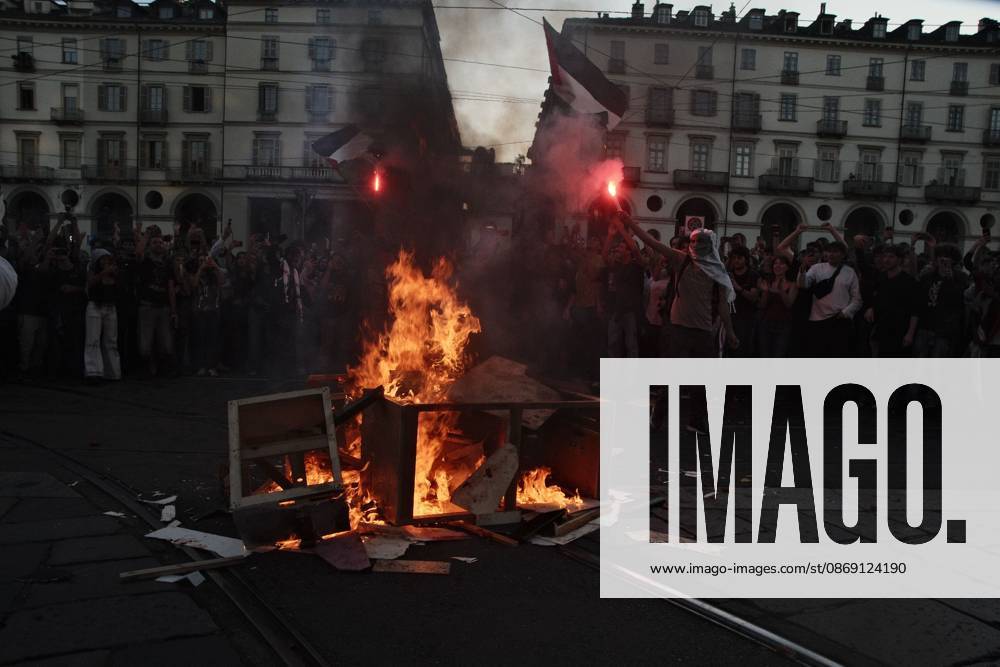 Turin, IT: TURIN, ITALY, OCTOBER 10, 2026: Thousands of pro-Palestinian demonstrators march through Turin during a protest organized by the Torino per Gaza coalition. Tensions erupted near Piazza Castello when police blocked access to the square, leading to clashes between demonstrators and riot police before some protesters were allowed to enter. Participants carried Palestinian flags and displayed effigies of Israeli Prime Minister Benjamin Netanyahu and US President Donald Trump as they marched through the city in support of Palestine. Turin IT - ZUMAq101 20261010_zna_q101_272