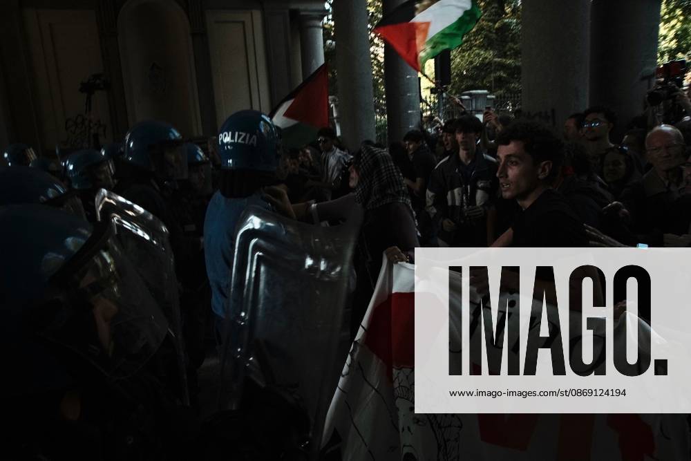 Turin, IT: TURIN, ITALY, OCTOBER 10, 2026: Thousands of pro-Palestinian demonstrators march through Turin during a protest organized by the Torino per Gaza coalition. Tensions erupted near Piazza Castello when police blocked access to the square, leading to clashes between demonstrators and riot police before some protesters were allowed to enter. Participants carried Palestinian flags and displayed effigies of Israeli Prime Minister Benjamin Netanyahu and US President Donald Trump as they marched through the city in support of Palestine. Turin IT - ZUMAq101 20261010_zna_q101_276