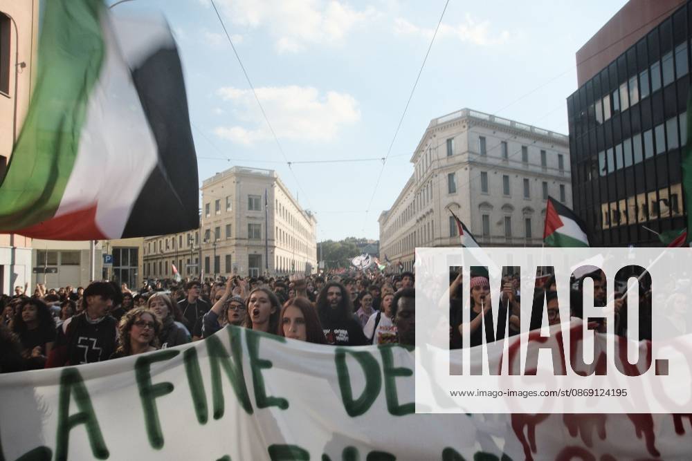Turin, IT: TURIN, ITALY, OCTOBER 10, 2026: Thousands of pro-Palestinian demonstrators march through Turin during a protest organized by the Torino per Gaza coalition. Tensions erupted near Piazza Castello when police blocked access to the square, leading to clashes between demonstrators and riot police before some protesters were allowed to enter. Participants carried Palestinian flags and displayed effigies of Israeli Prime Minister Benjamin Netanyahu and US President Donald Trump as they marched through the city in support of Palestine. Turin IT - ZUMAq101 20261010_zna_q101_277