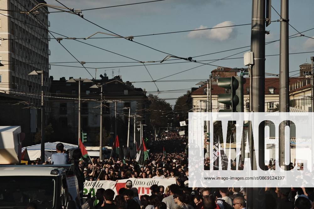 Turin, IT: TURIN, ITALY, OCTOBER 10, 2026: Thousands of pro-Palestinian demonstrators march through Turin during a protest organized by the Torino per Gaza coalition. Tensions erupted near Piazza Castello when police blocked access to the square, leading to clashes between demonstrators and riot police before some protesters were allowed to enter. Participants carried Palestinian flags and displayed effigies of Israeli Prime Minister Benjamin Netanyahu and US President Donald Trump as they marched through the city in support of Palestine. Turin IT - ZUMAq101 20261010_zna_q101_279