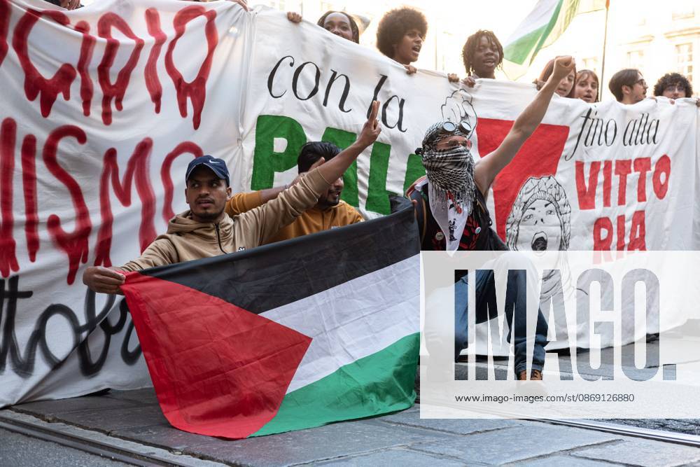 TURIN, ITALY, OCTOBER 10, 2026: Thousands of demonstrators march through the streets of Turin during a regional protest in solidarity with Palestine. Participants from across the Piedmont region gathered for the demonstration organized by Torino per Gaza, waving Palestinian flags and carrying banners as they marched through the city center. The procession passed through several neighborhoods, including Barriera di Milano, before returning toward central Turin. Italian news agency ANSA estimated attendance at around 8,000, while organizers claimed 20,000 participants. Turin Italy - ZUMAq101 20261010_zna_q101_362