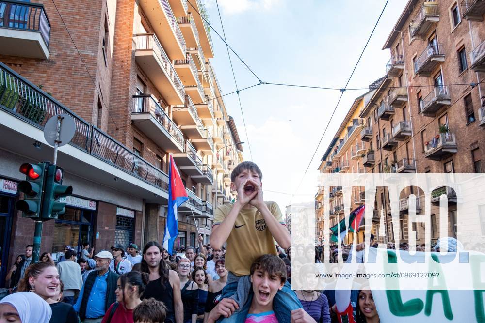 TURIN, ITALY, OCTOBER 10, 2026: Thousands of demonstrators march through the streets of Turin during a regional protest in solidarity with Palestine. Participants from across the Piedmont region gathered for the demonstration organized by Torino per Gaza, waving Palestinian flags and carrying banners as they marched through the city center. The procession passed through several neighborhoods, including Barriera di Milano, before returning toward central Turin. Italian news agency ANSA estimated attendance at around 8,000, while organizers claimed 20,000 participants. Turin Italy - ZUMAq101 20261010_zna_q101_330