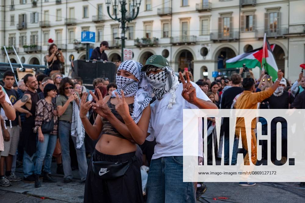 TURIN, ITALY, OCTOBER 10, 2026: Thousands of demonstrators march through the streets of Turin during a regional protest in solidarity with Palestine. Participants from across the Piedmont region gathered for the demonstration organized by Torino per Gaza, waving Palestinian flags and carrying banners as they marched through the city center. The procession passed through several neighborhoods, including Barriera di Milano, before returning toward central Turin. Italian news agency ANSA estimated attendance at around 8,000, while organizers claimed 20,000 participants. Turin Italy - ZUMAq101 20261010_zna_q101_344