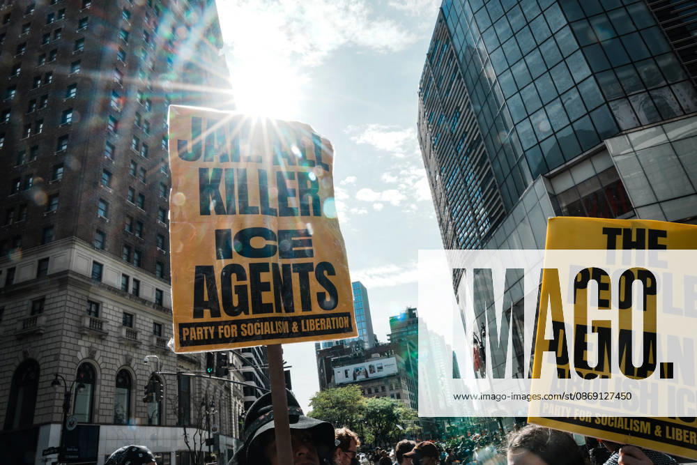 Protesters at an anti-ICE protest in Herald Square on October 10, 2026 in New York City. Protesters take to the streets following an incident where ICE agents shot a 28-year-old-man, Oscar Belgal while he in a vehicle with his 5-year old child in the Marble Hill neighborhood in the Bronx. New York USA - ZUMAb148 20261010_zap_b148_066