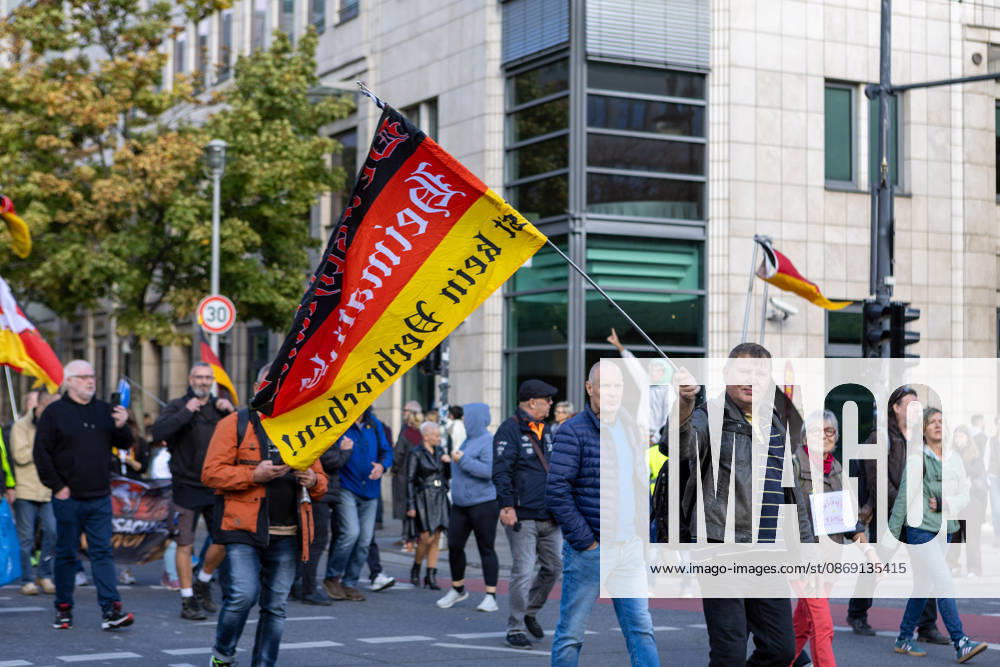 Demonstrators gather in Berlin for the Project M1llion rally against the German government. Participants take to the streets to voice their opposition to government policies, displaying banners and expressing their political demands. The demonstration brings together people seeking to make their concerns heard and draw public attention to their criticism of the country s political leadership. Berlin Germany - ZUMAc291 20261010_zip_c291_009