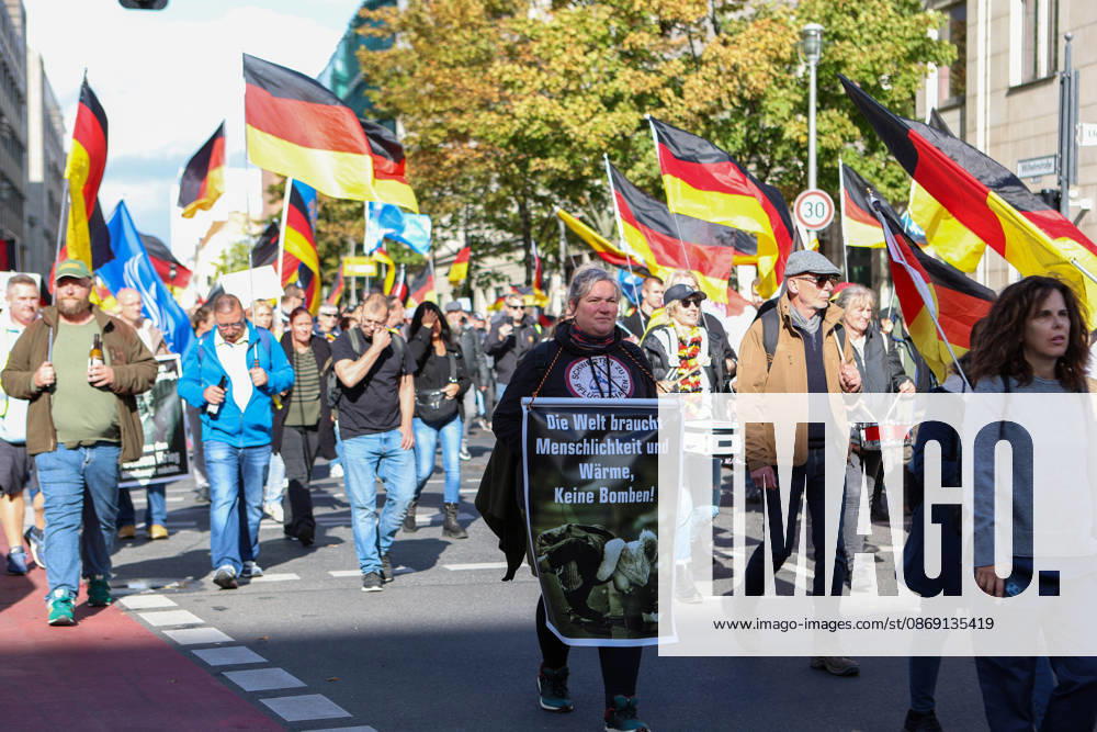 Demonstrators gather in Berlin for the Project M1llion rally against the German government. Participants take to the streets to voice their opposition to government policies, displaying banners and expressing their political demands. The demonstration brings together people seeking to make their concerns heard and draw public attention to their criticism of the country s political leadership. Berlin Germany - ZUMAc291 20261010_zip_c291_013