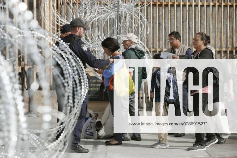 Migrant caravan Migrants from Central America have their backgrounds checked in Tijuana on the Mexican side of the border with the United States on Nov. 19, 2018.