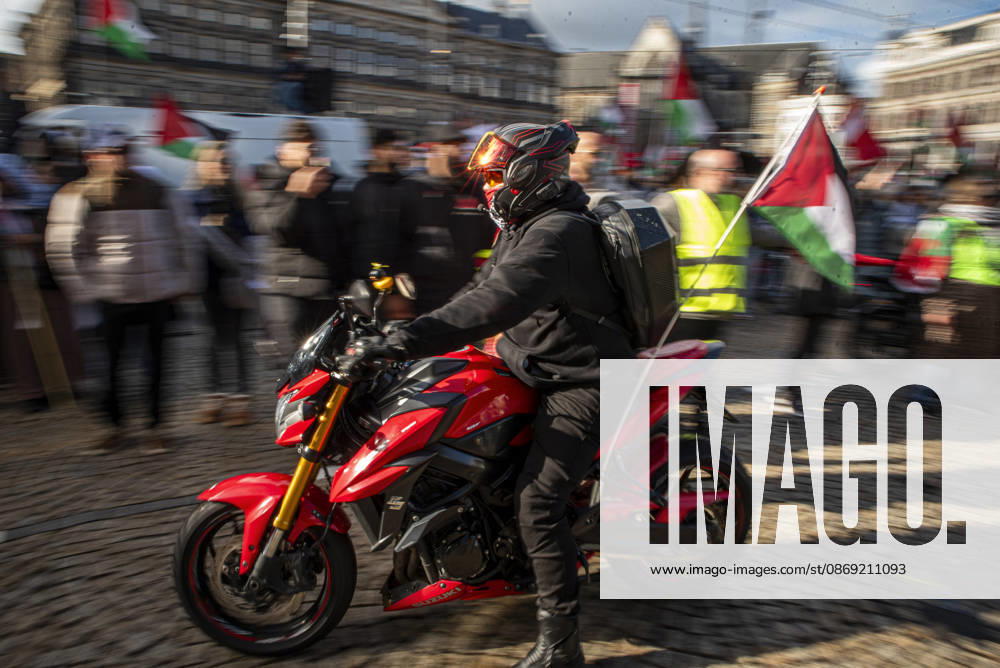 Amsterdam, North Holland, The Netherlands - Holland: 11 October 2026, Amsterdam, the Netherlands: The group Bikers for Palestine departs from Dam Square. Protesters gathered at Dam Square for speeches and anti-war music before marching through Amsterdamâ€⠢s city centre in a demonstration dubbed â€oeThree Years of Genocideâ€Â. The event marked three years since the start of the Israelâ€Hamas war. Demonstrators carried Palestinian flags and banners, demanding the Dutch government act against what they describe as a genocide in Gaza. Amsterdam The Netherlands - Holland - ZUMAp202 20261011_zip_p202_003