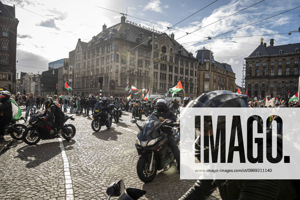 Amsterdam, North Holland, The Netherlands - Holland: 11 October 2026, Amsterdam, the Netherlands: The group Bikers for Palestine arrives to Dam Square. Protesters gathered at Dam Square for speeches and anti-war music before marching through AmsterdamÃ¢â‚¬â ¢s city centre in a demonstration dubbed Ã¢â‚¬oeThree Years of GenocideÃ¢â‚¬Â. The event marked three years since the start of the IsraelÃ¢â‚¬Hamas war. Demonstrators carried Palestinian flags and banners, demanding the Dutch government act against what they describe as a genocide in Gaza. Amsterdam The Netherlands - Holland - ZUMAp202 20261011_zip_p202_012