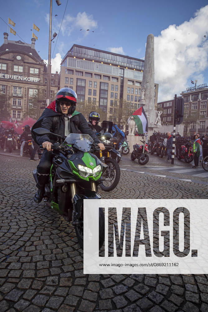 Amsterdam, North Holland, The Netherlands - Holland: 11 October 2026, Amsterdam, the Netherlands: The group Bikers for Palestine departs from Dam Square. Protesters gathered at Dam Square for speeches and anti-war music before marching through AmsterdamÃ¢â‚¬â ¢s city centre in a demonstration dubbed Ã¢â‚¬oeThree Years of GenocideÃ¢â‚¬Â. The event marked three years since the start of the IsraelÃ¢â‚¬Hamas war. Demonstrators carried Palestinian flags and banners, demanding the Dutch government act against what they describe as a genocide in Gaza. Amsterdam The Netherlands - Holland - ZUMAp202 20261011_zip_p202_018