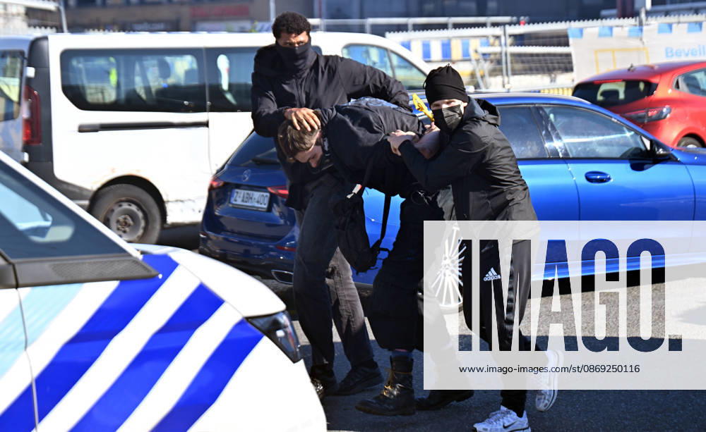 Clashes break out between police and protesters in Brussels BRUSSELS, BELGIUM - OCTOBER 12: A protestor is detained during a demonstration organized as part of a public service strike against the Federal Government s budget measures in Brussels, Belgium on October 12, 2026. Dursun Aydemir Anadolu Brussels Belgium. Editorial use only. Please get in touch for any other usage.