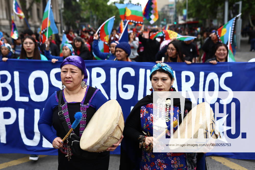 Hundreds of people protest against Columbus Day in Santiago SANTIAGO, CHILE - OCTOBER 12: Mapuche groups and other indigenous organizations are participating in the traditional protest against Columbus Day in Santiago, Chile, on October 12, 2026. Demonstrators demanded indigenous rights and territorial recognition. Lucas Aguayo Araos Anadolu Santiago Chile. Editorial use only. Please get in touch for any other usage.
