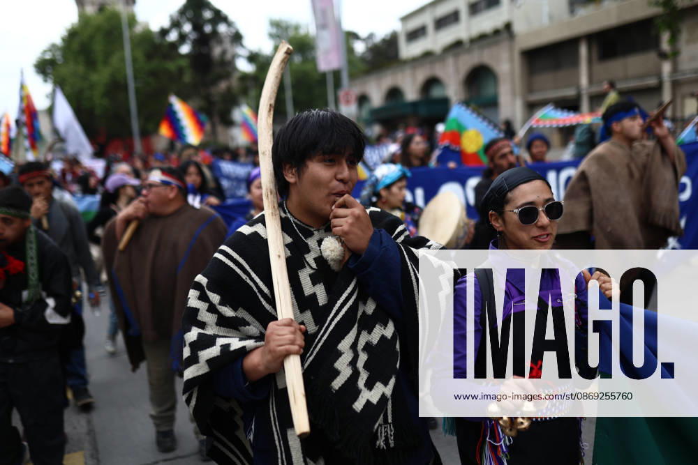 Hundreds of people protest against Columbus Day in Santiago SANTIAGO, CHILE - OCTOBER 12: Mapuche groups and other indigenous organizations are participating in the traditional protest against Columbus Day in Santiago, Chile, on October 12, 2026. Demonstrators demanded indigenous rights and territorial recognition. Lucas Aguayo Araos Anadolu Santiago Chile. Editorial use only. Please get in touch for any other usage.