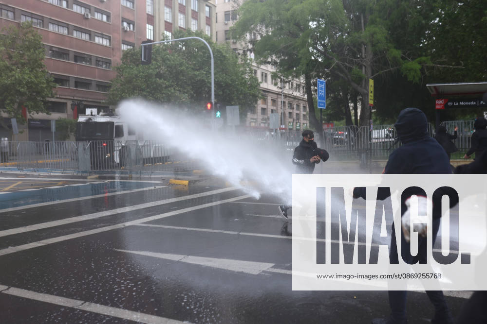 Hundreds of people protest against Columbus Day in Santiago SANTIAGO, CHILE - OCTOBER 12: Demonstrators clash with police during the traditional protest against Columbus Day in Santiago, Chile, on October 12, 2026. The protesters demanded Indigenous rights and territorial recognition. Lucas Aguayo Araos Anadolu Santiago Chile. Editorial use only. Please get in touch for any other usage.
