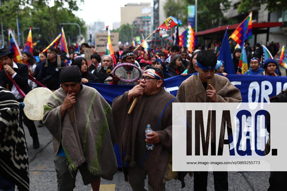 Hundreds of people protest against Columbus Day in Santiago SANTIAGO, CHILE - OCTOBER 12: Mapuche groups and other indigenous organizations are participating in the traditional protest against Columbus Day in Santiago, Chile, on October 12, 2026. Demonstrators demanded indigenous rights and territorial recognition. Lucas Aguayo Araos Anadolu Santiago Chile. Editorial use only. Please get in touch for any other usage.