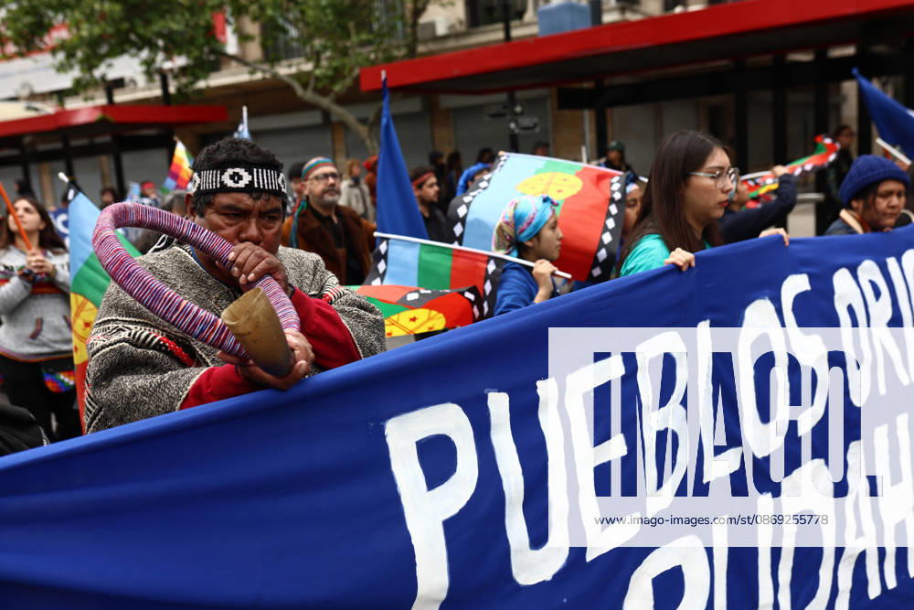 Hundreds of people protest against Columbus Day in Santiago SANTIAGO, CHILE - OCTOBER 12: A Mapuche protester plays a trutruca (a traditional wind instrument of the Mapuche people in Chile) during a protest opposing Columbus Day in Santiago, Chile, on October 12, 2026. Protesters demanded indigenous rights and territorial recognition. Lucas Aguayo Araos Anadolu Santiago Chile. Editorial use only. Please get in touch for any other usage.