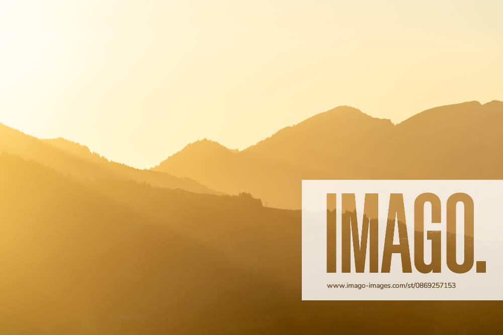 Autumn evening in the Allgäu: A view of the setting sun in the Bavarian Alps near Oberjoch, Bad Hindelang, Bavaria, Germany