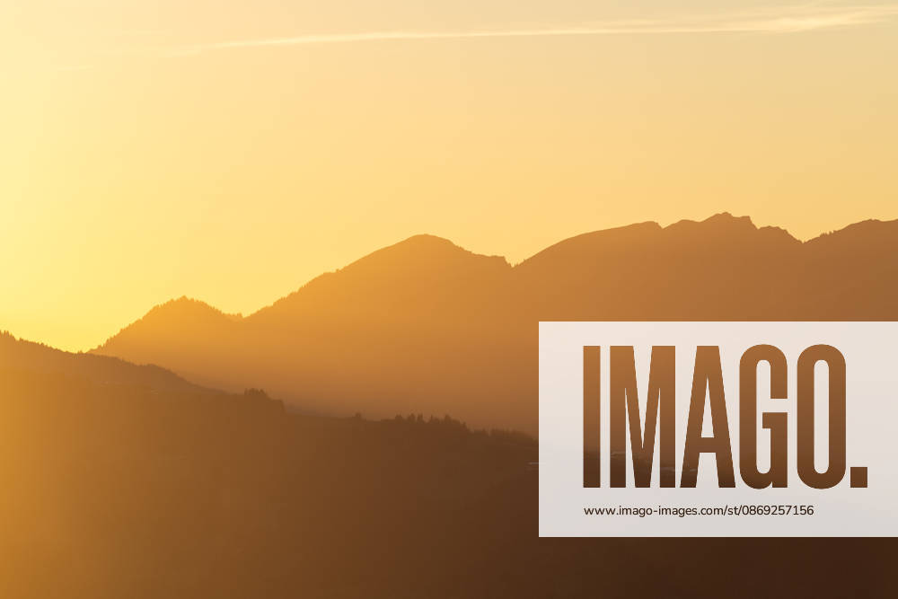 Autumn evening in the Allgäu: A view of the setting sun in the Bavarian Alps near Oberjoch, Bad Hindelang, Bavaria, Germany