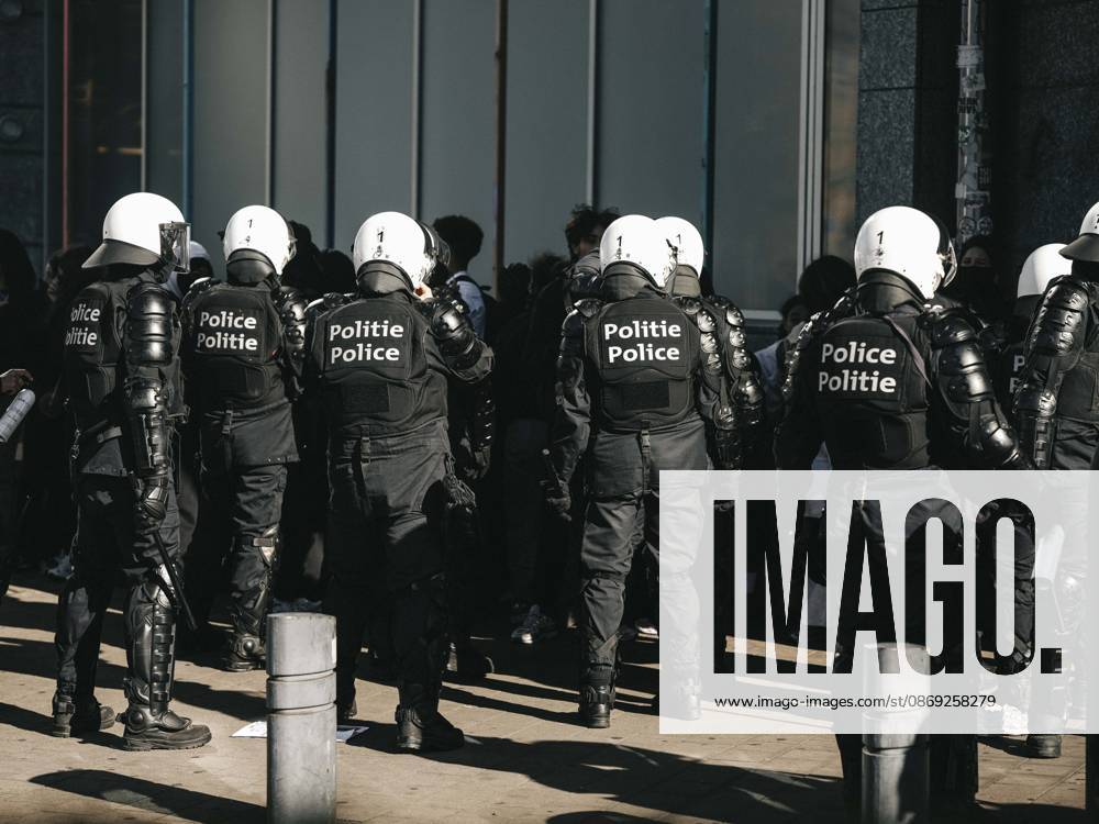 Brussels Belgium Protest Riot police officers confront demonstrators during clashes in Brussels, Belgium on October 12, 2026. Protesters and trade union members stage demonstrations and clash with police during a nationwide public-sector strike against government austerity measures, budget cuts, and reform plans in Brussels, Belgium. Brussels Brussels Capital Belgium