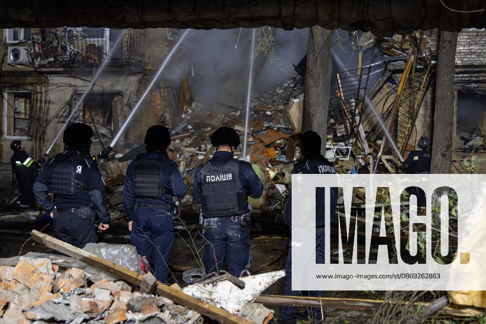 KHARKIV, UKRAINE, OCTOBER 12, 2026: Emergency workers conduct rescue operations at a residential building damaged in a Russian strike in Kharkiv s Kholodnohirskyi district. A firefighter was injured by falling concrete debris while clearing the rubble and was evacuated on a stretcher. Kharkiv Ukraine - ZUMAq101 20261013_zna_q101_004