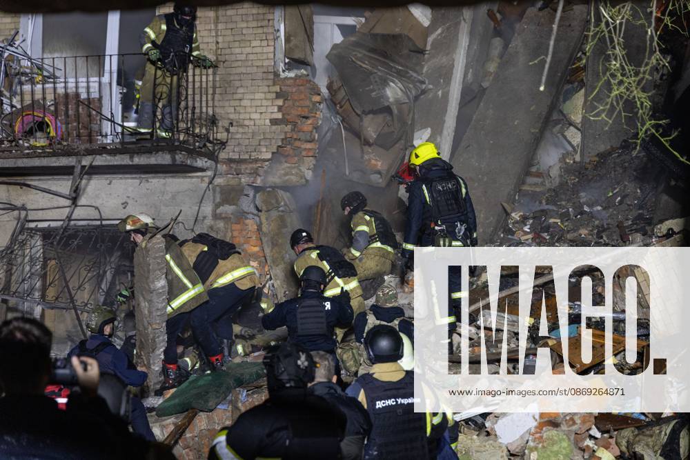 Rescue Operations After Kharkiv Strike KHARKIV, UKRAINE, OCTOBER 12, 2026: Emergency workers conduct rescue operations at a residential building damaged in a Russian strike in Kharkiv s Kholodnohirskyi district. A firefighter was injured by falling concrete debris while clearing the rubble and was evacuated on a stretcher. Kharkiv Ukraine