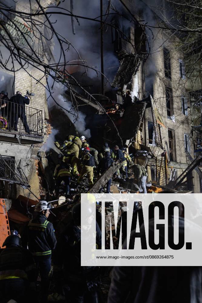 Rescue Operations After Kharkiv Strike KHARKIV, UKRAINE, OCTOBER 12, 2026: Emergency workers conduct rescue operations at a residential building damaged in a Russian strike in Kharkiv s Kholodnohirskyi district. A firefighter was injured by falling concrete debris while clearing the rubble and was evacuated on a stretcher. Kharkiv Ukraine